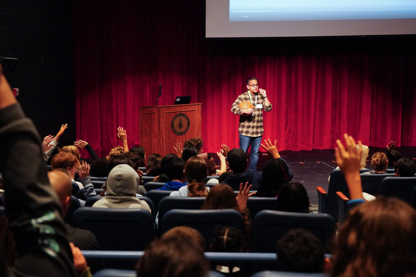 Amar speaking to students